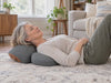 Woman relaxing with her neck resting on Dorsawell One